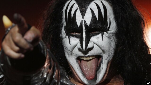 Gene Simmons of the music group Kiss performs during a concert in Mexico City, Saturday, Sept. 29, 2012. (AP Photo/Marco Ugarte)