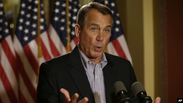 House Speaker John Boehner of Ohio gestures as he speaks during a news conference on Capitol Hill in Washington to discuss the pending fiscal cliff, December 7, 2012.