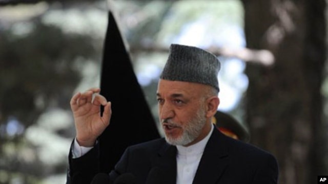Afghan President Hamid Karzai speaks during a press conference at the Presidential palace in Kabul, May 31, 2011