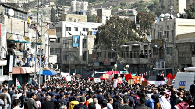Under heavy security, thousands protested in Amman, Jordan last week.  Analysts say if activist's demands are not met, what are now peaceful well-organized demonstrations are likely to turn more urgent, and more radical.