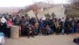 Syrians wait for the arrival of an aid convoy, Jan. 11, 2016, in the besieged town of Madaya as part of a landmark six-month deal reached in September for an end to hostilities in those areas in exchange for humanitarian assistance.