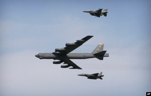 A U.S. Air Force B-52 bomber flies over Osan Air Base in Pyeongtaek, South Korea, Jan. 10, 2016.