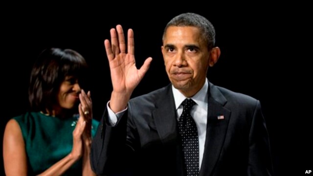 Presiden Obama dan Ibu Negara Michelle Obama menghadiri acara tahunan sarapan dan doa nasional di Washington, Kamis (7/2).  