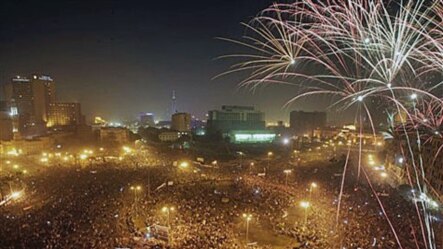 Fireworks explode as tens of thousands of Egyptians celebrate the fall of the regime of former President Hosni Mubarak in Tahrir Square in downtown Cairo, Egypt, February 18, 2011.