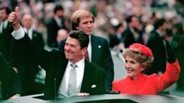 President Ronald Reagan and his wife Nancy during the inaugural parade in Washington following his swearing in as the 40th president of the United States on January 20, 1981