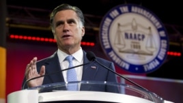 Republican presidential candidate Mitt Romney gestures during a speech to the NAACP annual convention in Houston, Texas, July 11, 2012. 
