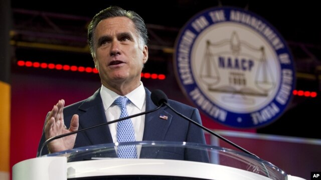Republican presidential candidate Mitt Romney gestures during a speech to the NAACP annual convention in Houston, Texas, July 11, 2012. 