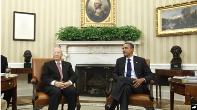 President Barack Obama meets with Prime Minister Beji Caid Essebsi of Tunisia in the Oval Office at the White House in Washington, Friday, Oct. 7, 2011. (file photo)