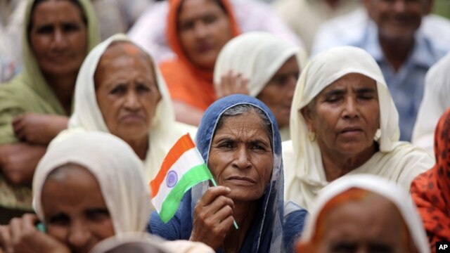 Hindus who migrated from Pakistan to Jammu in 1947 participate in a protest demanding citizenship rights in Jammu, India, Sept. 8, 2012. 