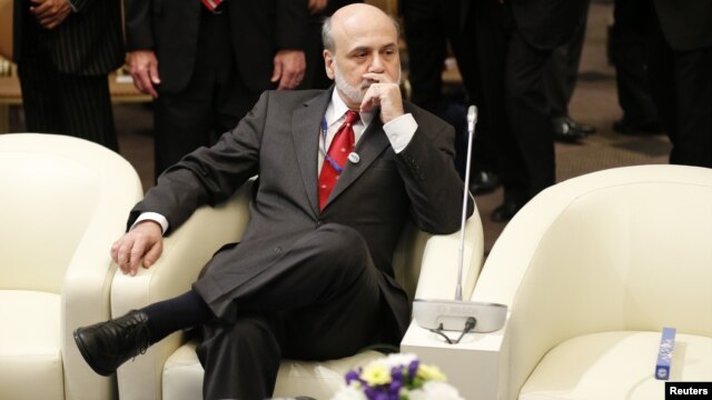 U.S. Federal Reserve Chairman Ben Bernanke is seen prior to the International Monetary and Financial Committee at the annual meetings of the IMF and the World Bank Group in Tokyo, October 13, 2012. 