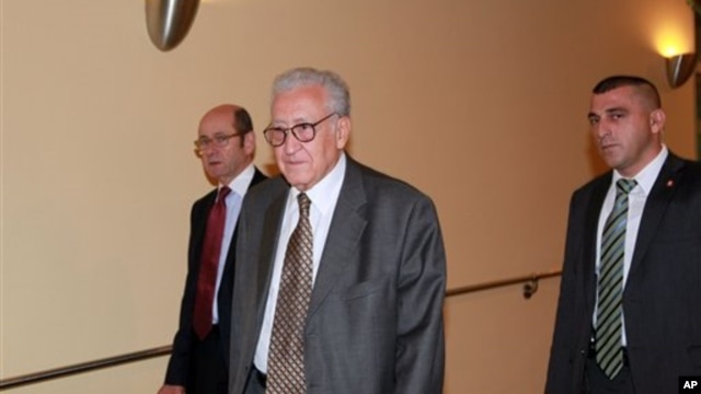 Lakhdar Brahimi, center, special representative for Syria, arrives at closed door Security Council consultations, U.N. headquarters, New York, Sept.  24,  2012.