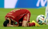 The agony of defeat for Spain.
