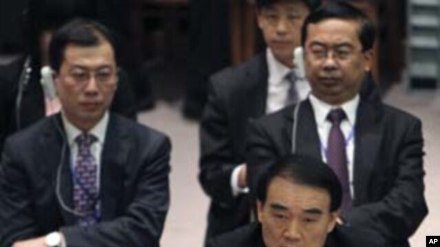 Chinese Ambassador to the United Nations Li Baodong addresses the Security Council in New York after a vote on a U.N. resolution backing an Arab League peace plan on the Syrian crisis, February 4, 2012.