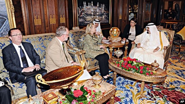 In this photo released by Saudi Press Agency, King Abdullah of Saudi Arabia, right, meets with Secretary of State Hillary Rodham Clinton, 3rd left, in Riyadh, Saudi Arabia, Friday, March 30, 2012.