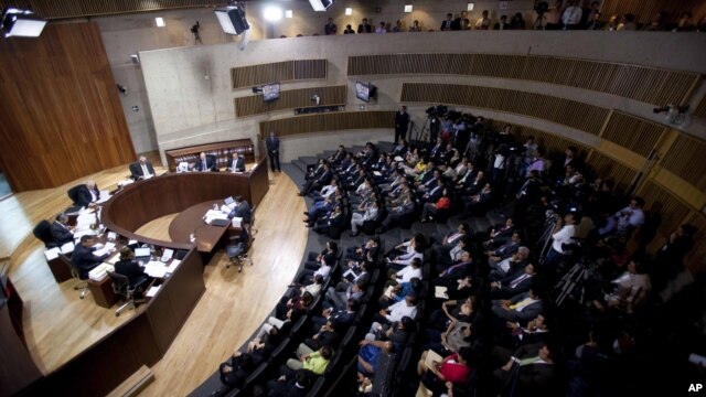Members of the Federal Electoral Tribunal attend a session in Mexico City, August 30, 2012. 