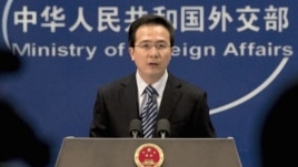 Chinese Foreign Ministry spokesman Hong Lei answers reporters' questions in Beijing.  (file photo)
