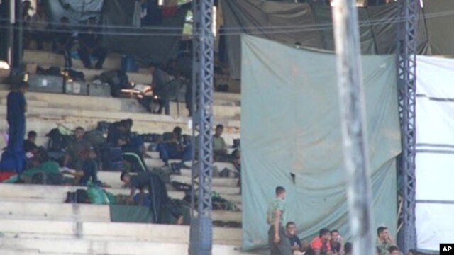 Army soldiers appear to have set up a makeshift camp in race course grandstands near office of ex-Gen. Fonseka