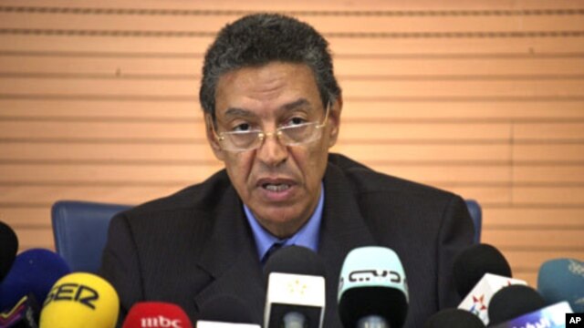 Moroccan Interior Minister Taieb Cherkaoui speaks during a news conference in Rabat, following last month's deadly cafe bombing in Marrakesh, May 6, 2011