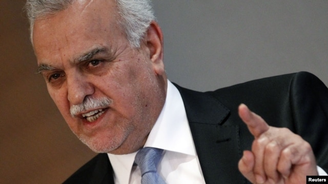 Iraq's fugitive Vice President Tareq al-Hashemi gestures as he addresses the media in Ankara, September 10, 2012.