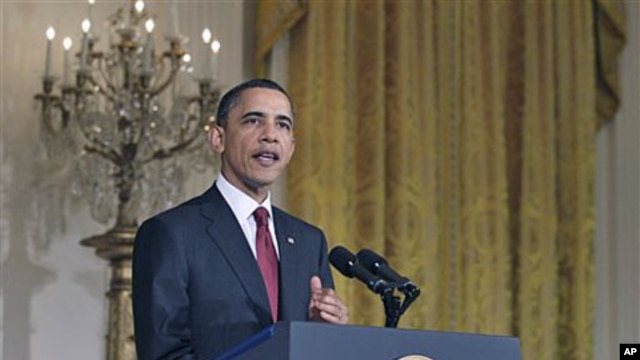 President Barack Obama makes a statement on Libya in the East Room of the White House in Washington, March 18, 2011