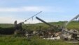 Remains of a downed Azerbaijani forces helicopter lies in a field in the separatist Nagorno-Karabakh region, April 2, 2016. Azerbaijan's Defense Ministry said one of its helicopters was shot down in heavy fighting Saturday between Armenian and Azerbaijani