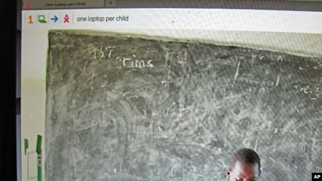 The One Laptop Per Child website shows students in Kenya using the small green and white computer, March 2011