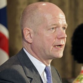 British Foreign Secretary William Hague speaks at a news conference in Cape Town, February 13, 2012