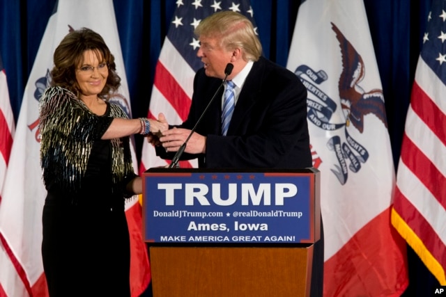 Former Alaska Gov. Sarah Palin, left, endorses Republican presidential candidate Donald Trump during a rally at the Iowa State University in Ames, Iowa, Jan. 19, 2016.