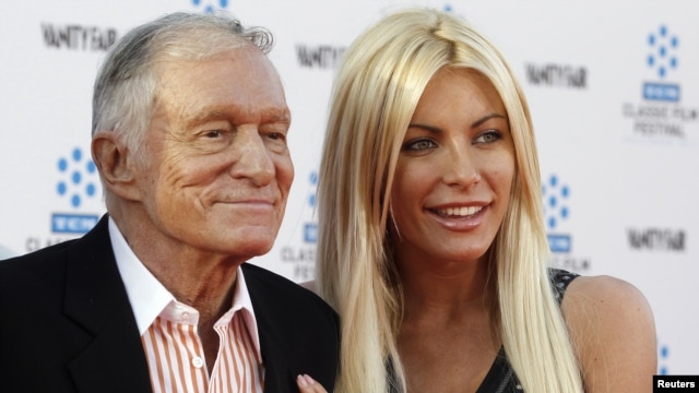 Hugh Hefner and his fiancee, Playboy Playmate Crystal Harris, arrive at the opening night gala of the 2011 TCM Classic Film Festival featuring a screening of a restoration of 'An American In Paris' in Hollywood, California, April 28, 2011.  