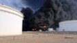 Smoke rises from an oil tank fire in Es Sider port, Libya, Dec. 26, 2014.