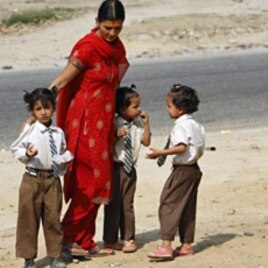 Shreejana Thapa accompanies her daughters after school at Naubise village near Kathmandu (File)