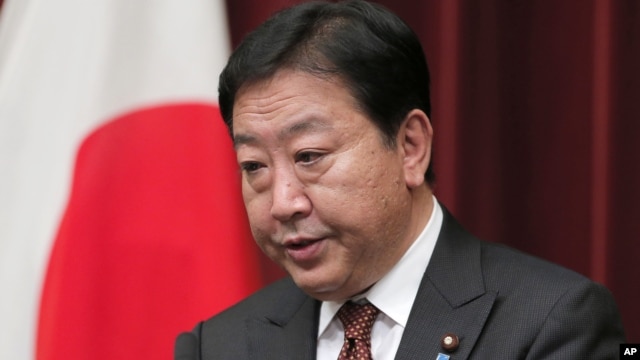 Japanese Prime Minister Yoshihiko Noda speaks during a press conference at his official residence in Tokyo,  August 24, 2012. 