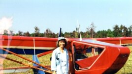 Jeanette Smolinski in front of the ultralight she built, with her father, in her spare time. (Courtesy J. Smolinski)