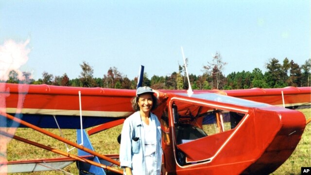 Jeanette Smolinski in front of the ultralight she built, with her father, in her spare time. (Courtesy J. Smolinski)