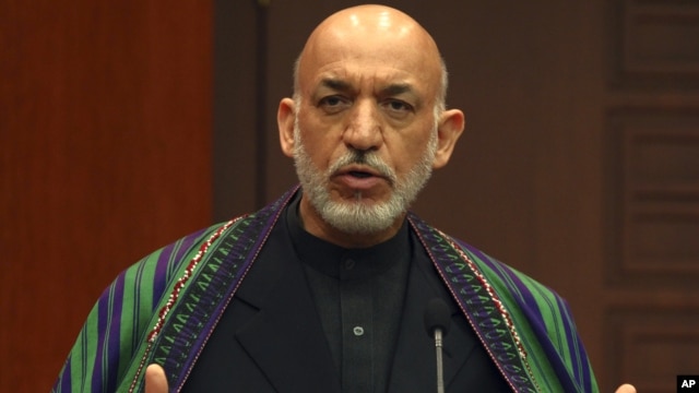 Afghan President Hamid Karzai speaks to the media during a news conference, December 12, 2012.