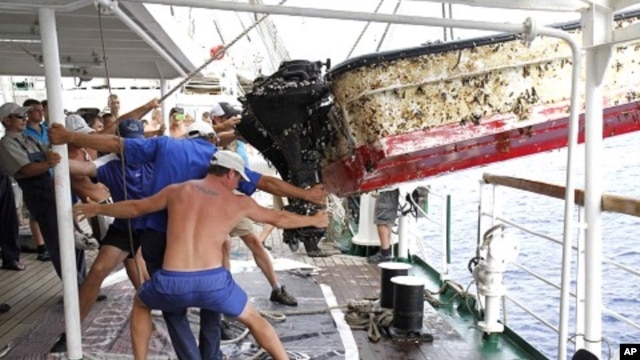Russian sail training ship, the STS Pallada, found an array of unmistakable tsunami debris on its homeward voyage from Honolulu to Vladivostok.