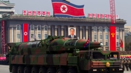 North Korean vehicle carrying a missile passes by during a mass military parade in Pyongyang's Kim Il Sung Square to celebrate the centenary of the birth of the late North Korean founder Kim Il Sung, April 15, 2012.