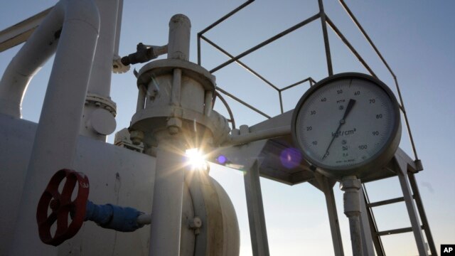 FILE - A gas pressure gauge of a main gas pipeline from Russia in the village of Boyarka near the capital Kyiv, Ukraine on Tuesday, Feb. 12, 2008. 