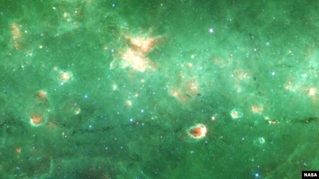 Researchers have identified a new spine-like structure of our Milky Way galaxy - a long, dense tendril of dust and gas. Credit: NASA/JPL/SSC