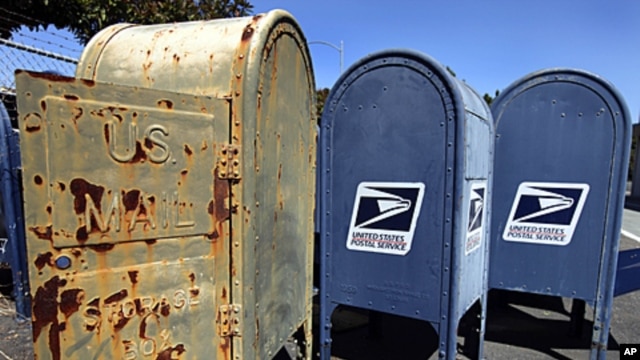 US Postal Service mailboxes are seen awaiting disposal September 1, 2011, in San Jose, California.
