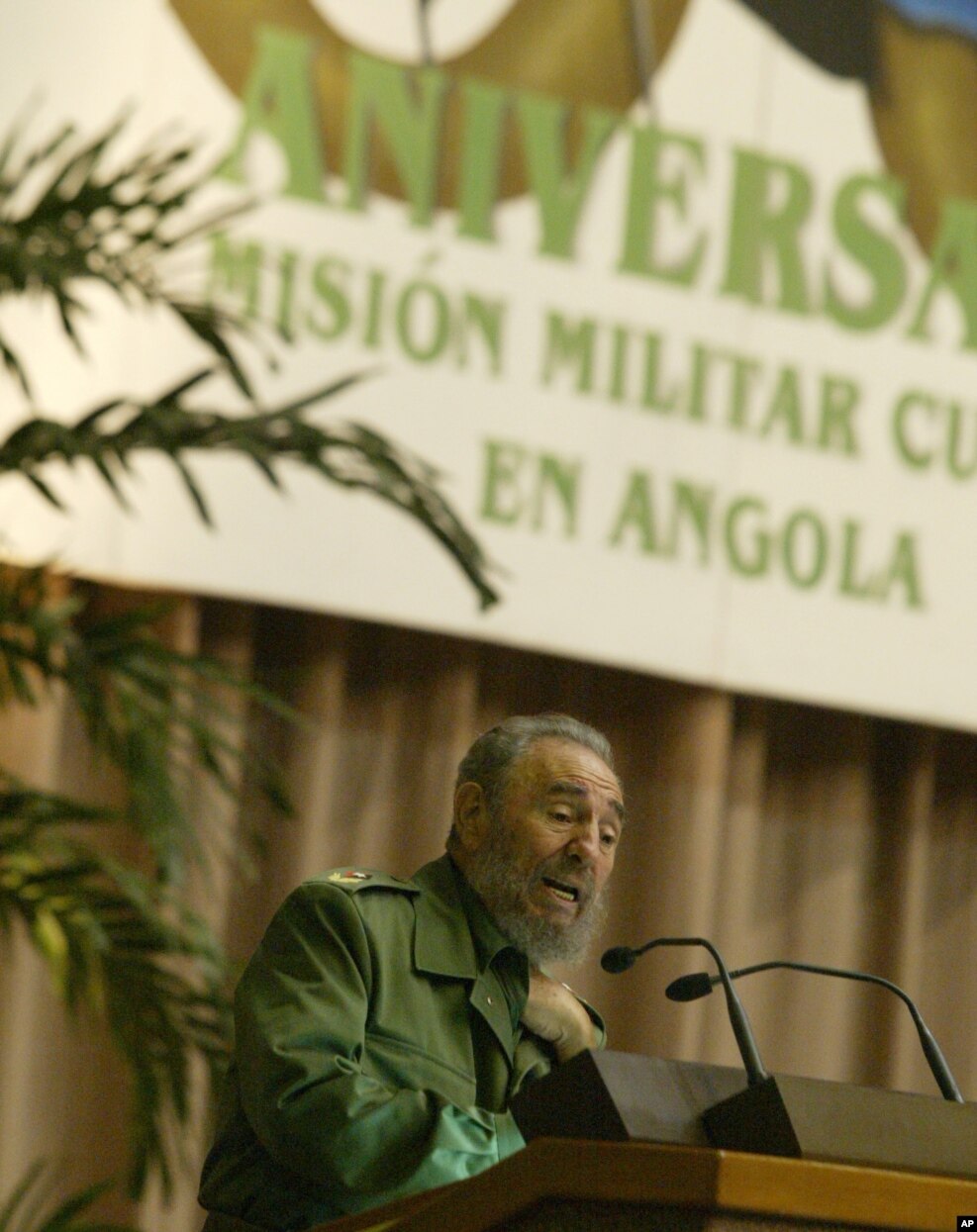 FILE - Fidel Castro, gestures while talking during an evening ceremony marking the 30th anniversary of Cuba's military mission in Angola, Dec. 2, 2005 in Havana.