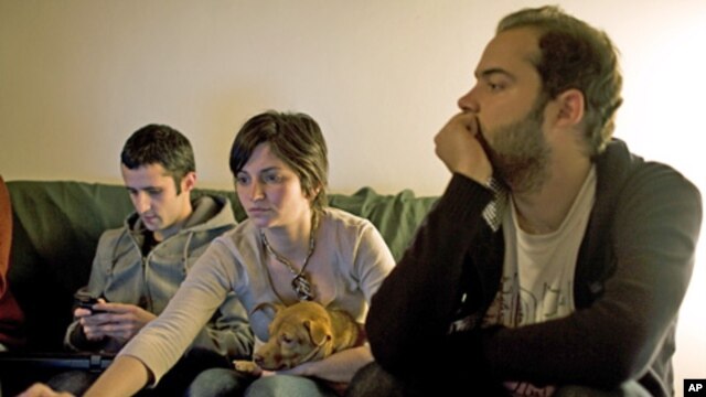 Three Portuguese workers, who started a social media campaign to vent their frustration at grim career prospects amid an acute economic crisis (file photo)