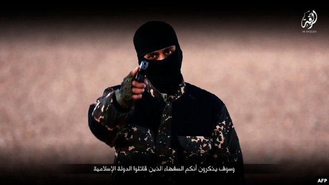 image grab taken from a video published by the media branch of the Islamic State (IS) group in the Raqa province (Welayat Raqa) on Jan. 3, 2016, purportedly shows an English-speaking IS fighter speaking to the camera at an undisclosed location.