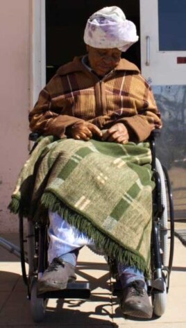 Grobicki says it’s ‘grateful’ patients like this woman, dozing in the sun while she waits to see the physiotherapist, who keep her going