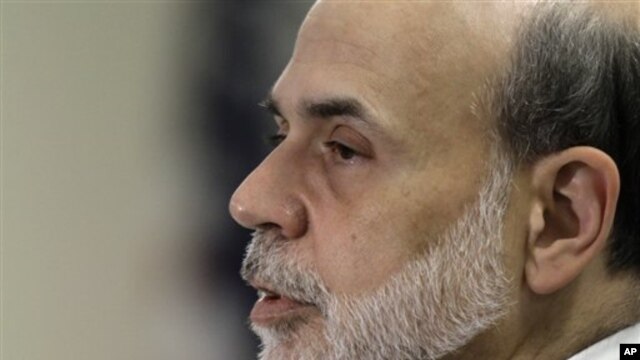 Federal Reserve chairman Ben Bernanke addresses a Federal Reserve conference, in Boston, 15 Oct 2010