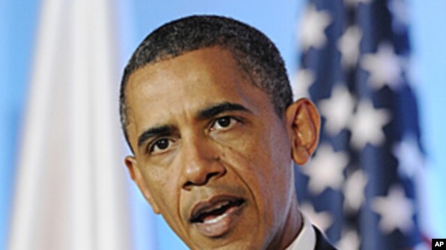 US President Barack Obama  speaks at a press conference after  talks with the Polish Prime Minister Donald Tusk, in Warsaw, Poland, May 28, 2011