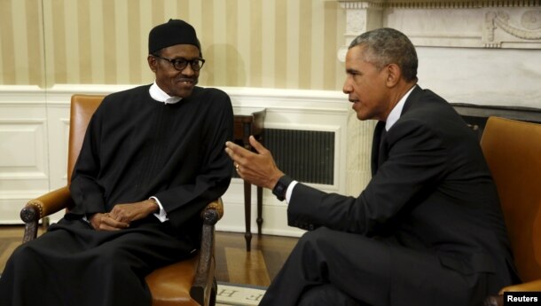 FILE - U.S. President Barack Obama meets with Nigerian President Muhammadu Buhari, left, in the Oval Office of the White House in Washington, D.C., July 20, 2015.