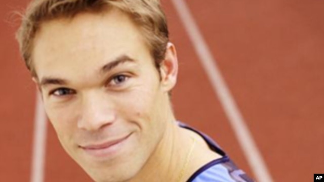 Olympian Nick Symmonds sports the Hanson Dodge Creative logo, after the company won an eBay auction on his left shoulder.