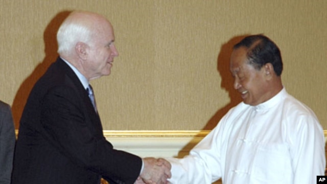 U.S. Sen. John McCain, left, is greeted by Myanmar's Vice President Thiha Thura Tin Aung Myint Oo during their meeting at the President's House in Nay Pyi Taw, Myanmar, June 1, 2011