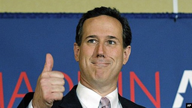 Republican presidential candidate, former Pennsylvania Sen. Rick Santorum gives a thumbs up during his election night party, Tuesday, March 13, 2012, in Lafayette, La. (AP Photo/Eric Gay)
